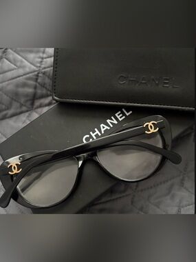 Chanel Black Cat-eye Glasses Featuring Gold Double C Logo On The Temples.